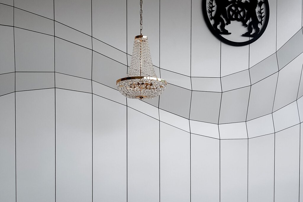 Geschäftseinrichtung Bäckerei Designwand mit Bäckerwappen.