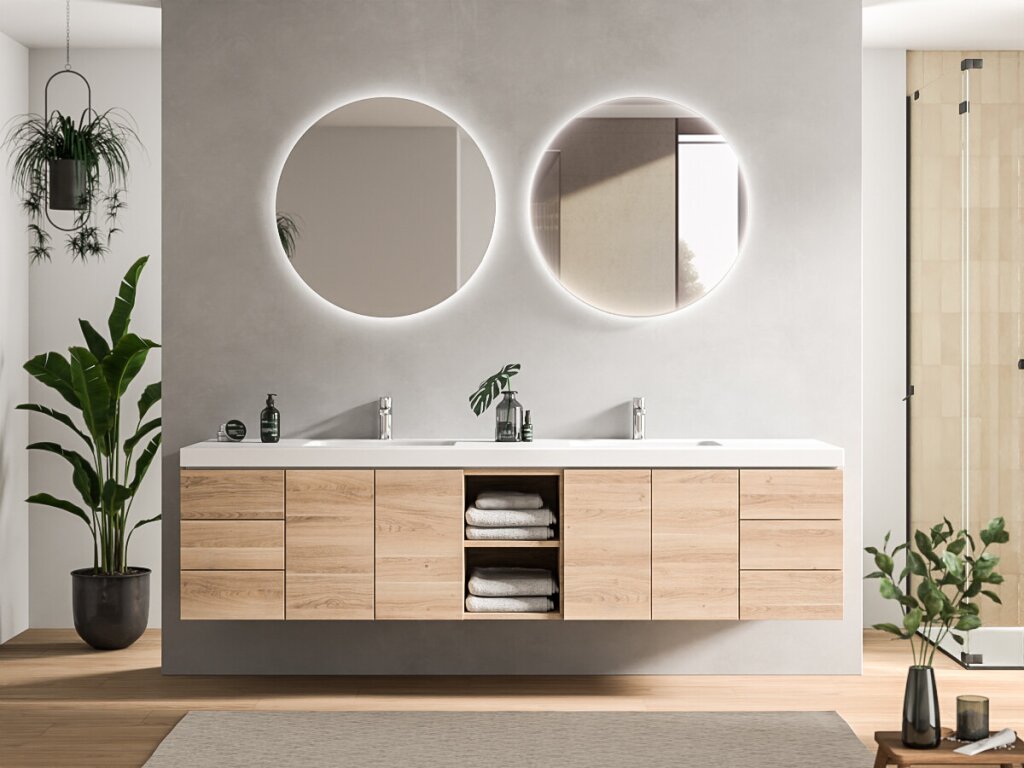 Ein Badezimmerunterschrank mit zwei Spiegeln und zwei Waschbecken.