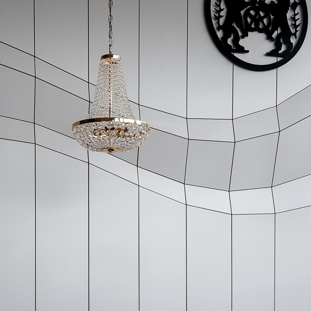 Geschäftseinrichtung Bäckerei Designwand mit Bäckerwappen.